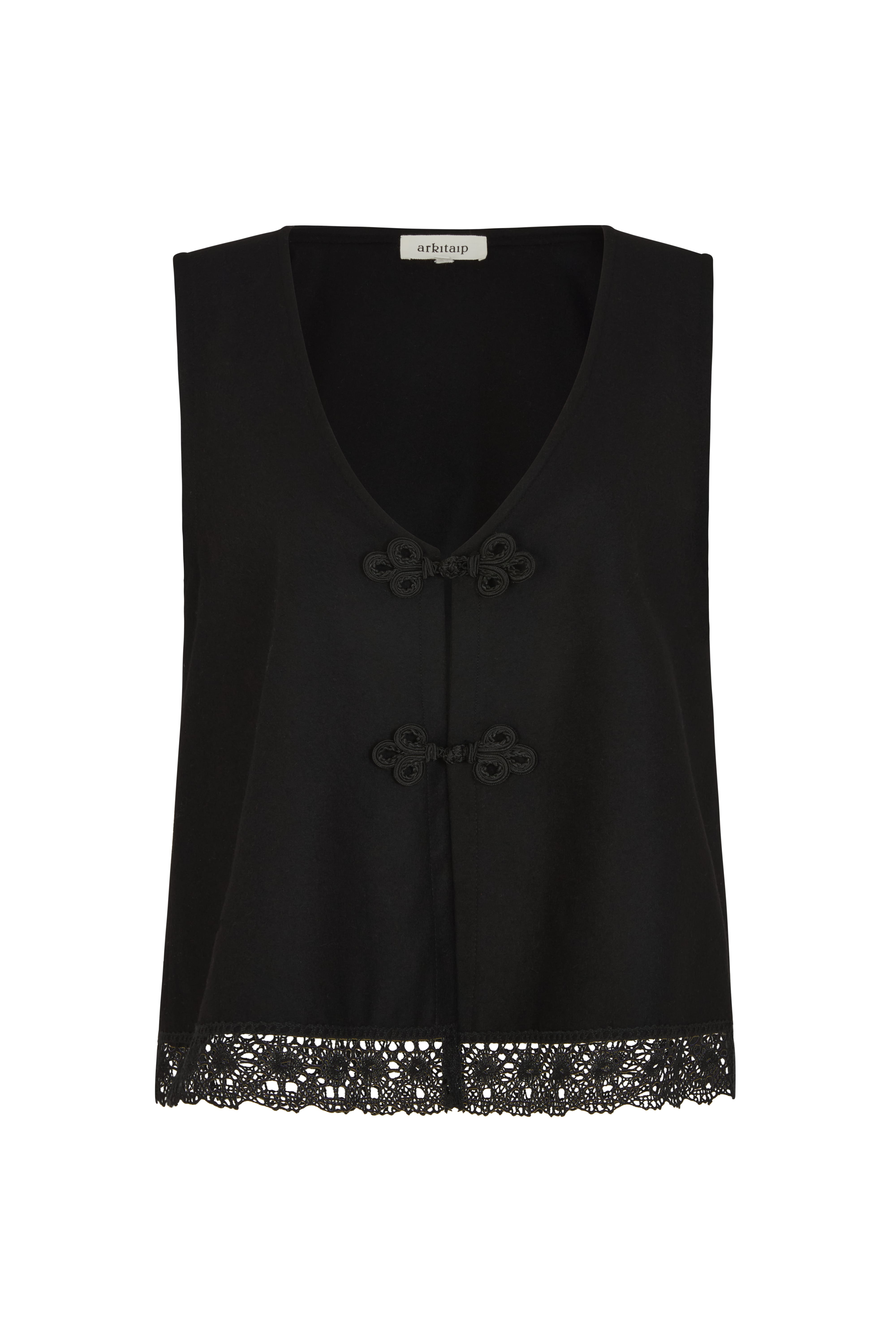 The Marie Sleeveless Wool Vest in black with lace trim